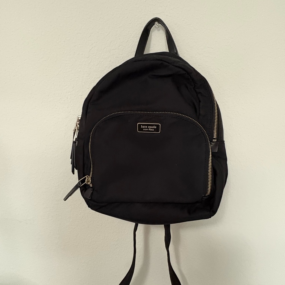 Kate Spade Dawn Medium logo black nylon backpack bag. Excellent used condition.